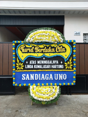 Papan Bunga Duka di Simpang Dua